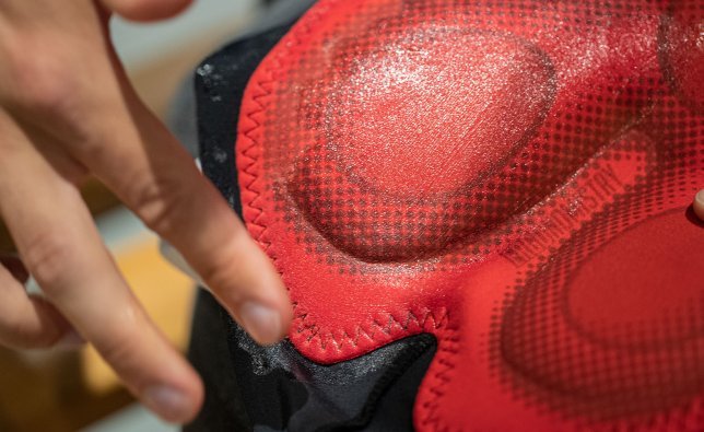 A close-up of the seat pad on Endura cycling shorts. The seams have been given a layer of Eule's chamois cream. There is a greasy film on the padding of the bib shorts.